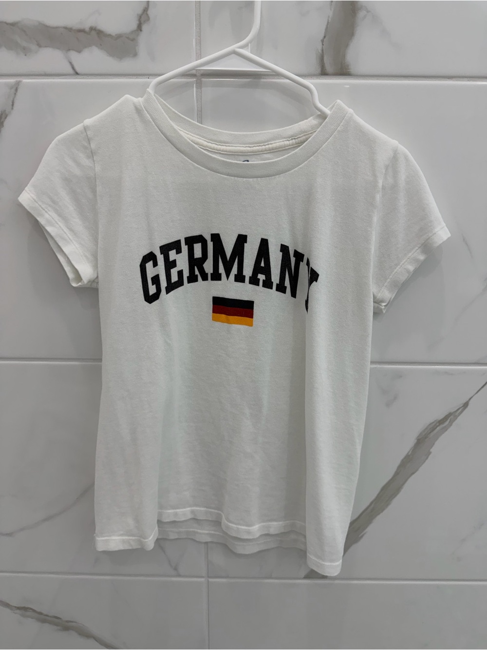 Brandy Melville White 'Germany' Graphic Tee with Flag Accent